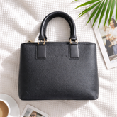 Louis Vuitton black leather satchel bag.