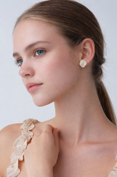 Silver Luna offers these Resin Rose Flower Stud Earrings featuring a detailed white rose design.