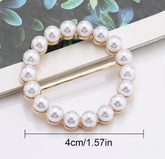 This product is a versatile pearl-inlaid metal brooch ring designed to be used as a scarf clip, a t-shirt hem fastener, or a waist adjustment buckle for clothing.