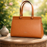 a David Jones brown top-handle handbag, likely made of PU leather.