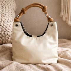 Miu Miu Nappa Ivy bag in talco leather.