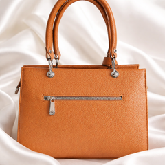 Michael Kors Sutton Medium Leather Satchel handbag in a brown color. 