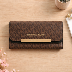 Michael Kors Jet Set Large Logo Trifold Wallet in brown signature PVC leather.  Dive deeper in AI Mode