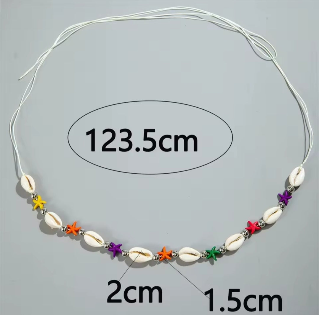 a beach starfish and seashell waist chain, commonly found under various brands such as SHEIN.
