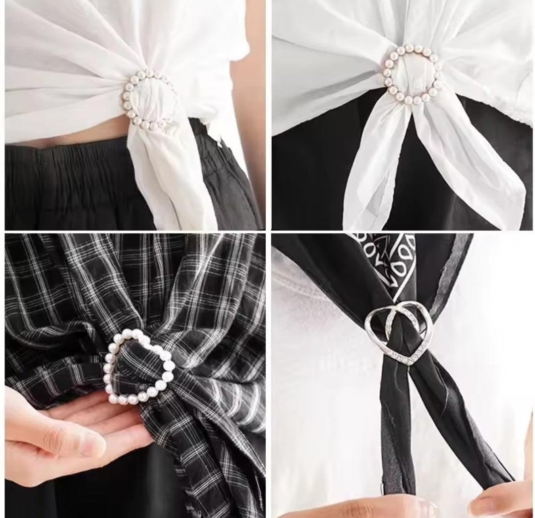 This product is a versatile pearl-inlaid metal brooch ring designed to be used as a scarf clip, a t-shirt hem fastener, or a waist adjustment buckle for clothing.