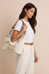  Miu Miu Nappa Ivy bag in talco leather. 